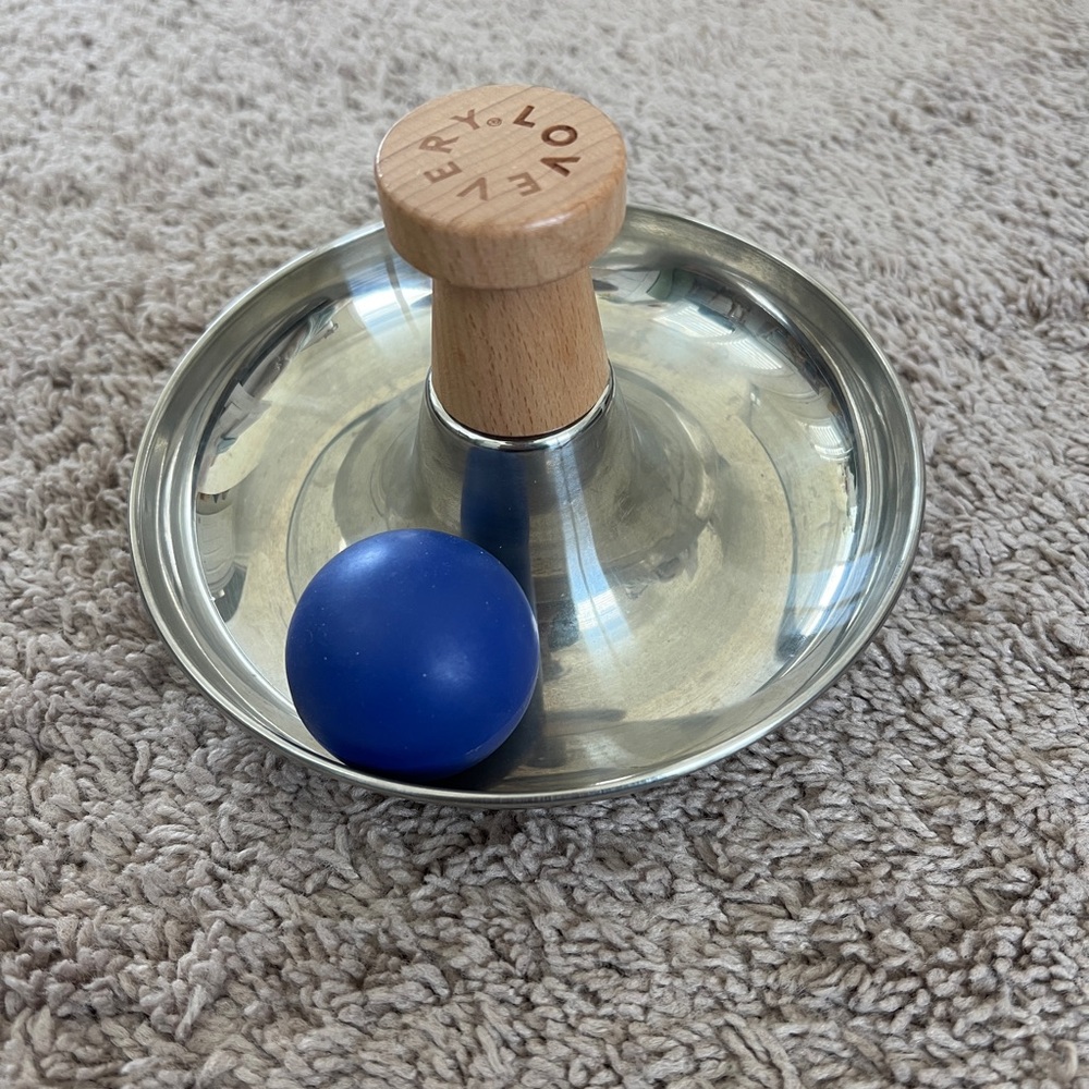 Lovevery tip and turn toy with ball